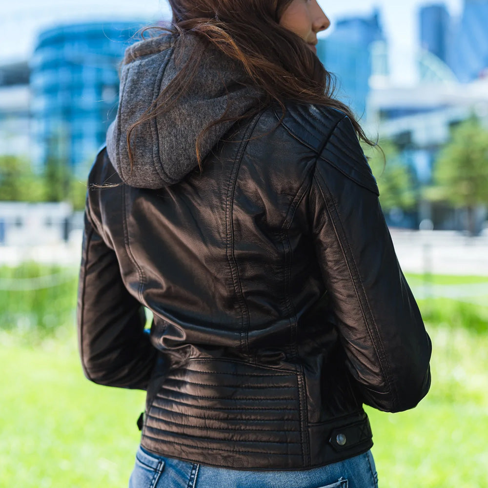 Woman wearing a stylish hooded leather jacket - backside view