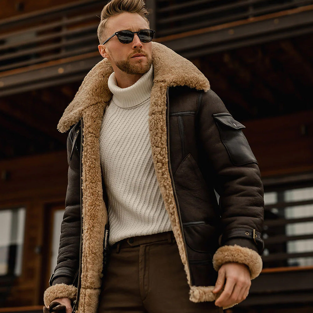 A stylish man wearing a dark brown shearling (sheepskin) jacket